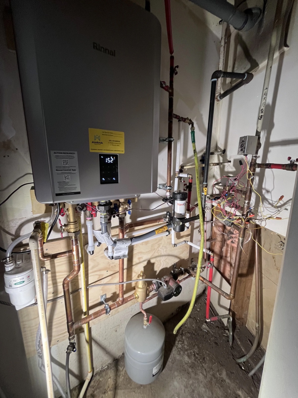 High-efficiency Rinnai combi boiler replacement with new piping and expansion tank