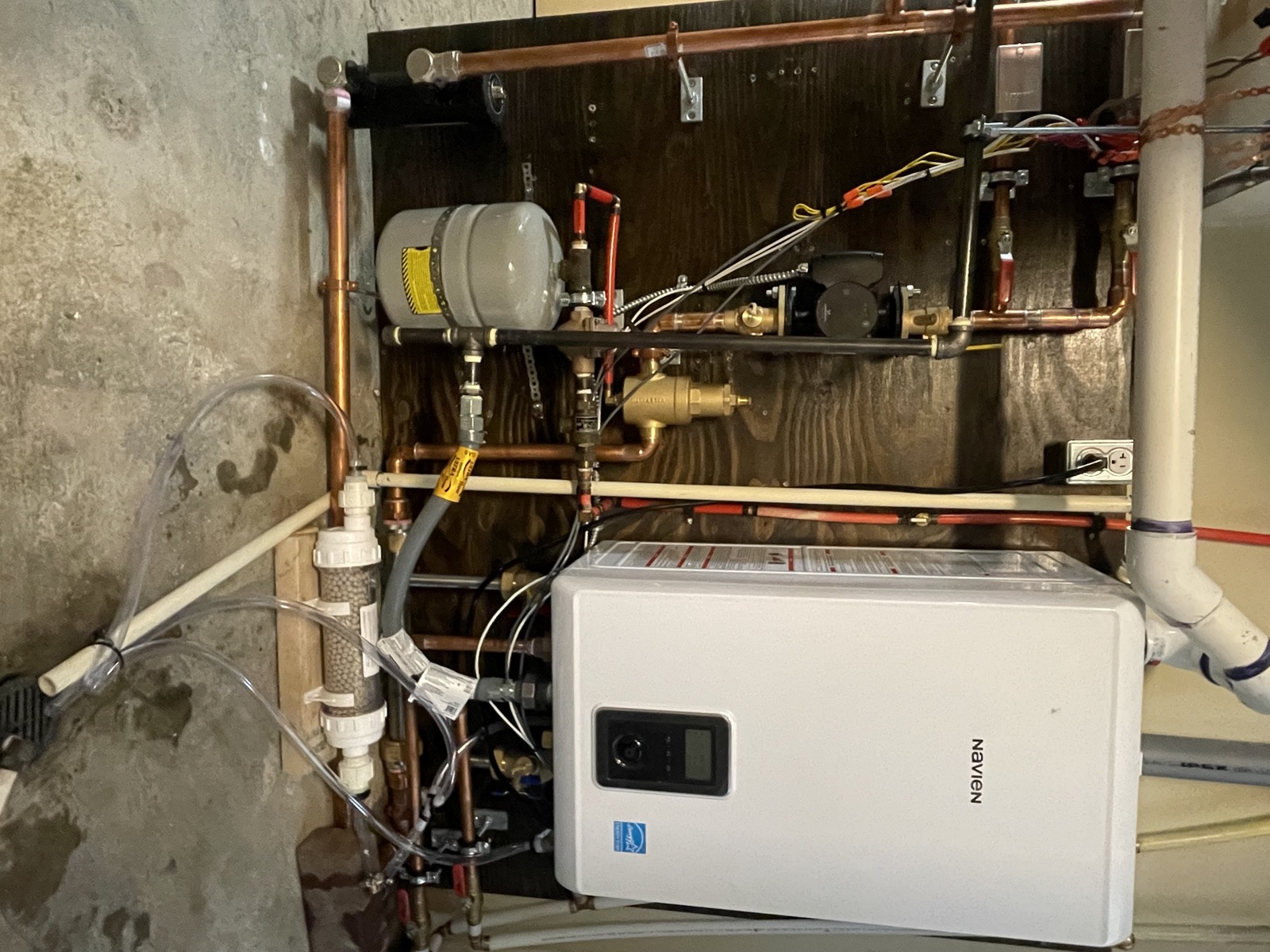 Navien combi-boiler installation with copper piping, expansion tank and gas line rough-in